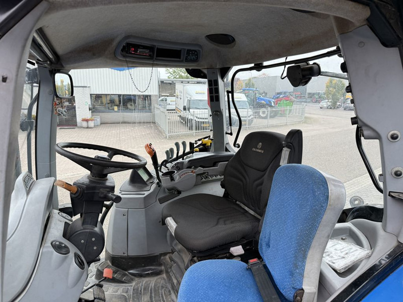 New Holland T7050 Power Command - Traktör: fotoğraf 5 New Holland T7050 Power Command - Traktör: fotoğraf 5