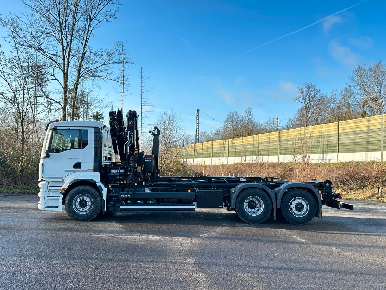 MAN TGS 26.470 6x2 Abrollkipper + Kran Hiab 138-3 - Kancalı yükleyici kamyon, Vinçli kamyon: fotoğraf 3 MAN TGS 26.470 6x2 Abrollkipper + Kran Hiab 138-3 - Kancalı yükleyici kamyon, Vinçli kamyon: fotoğraf 3