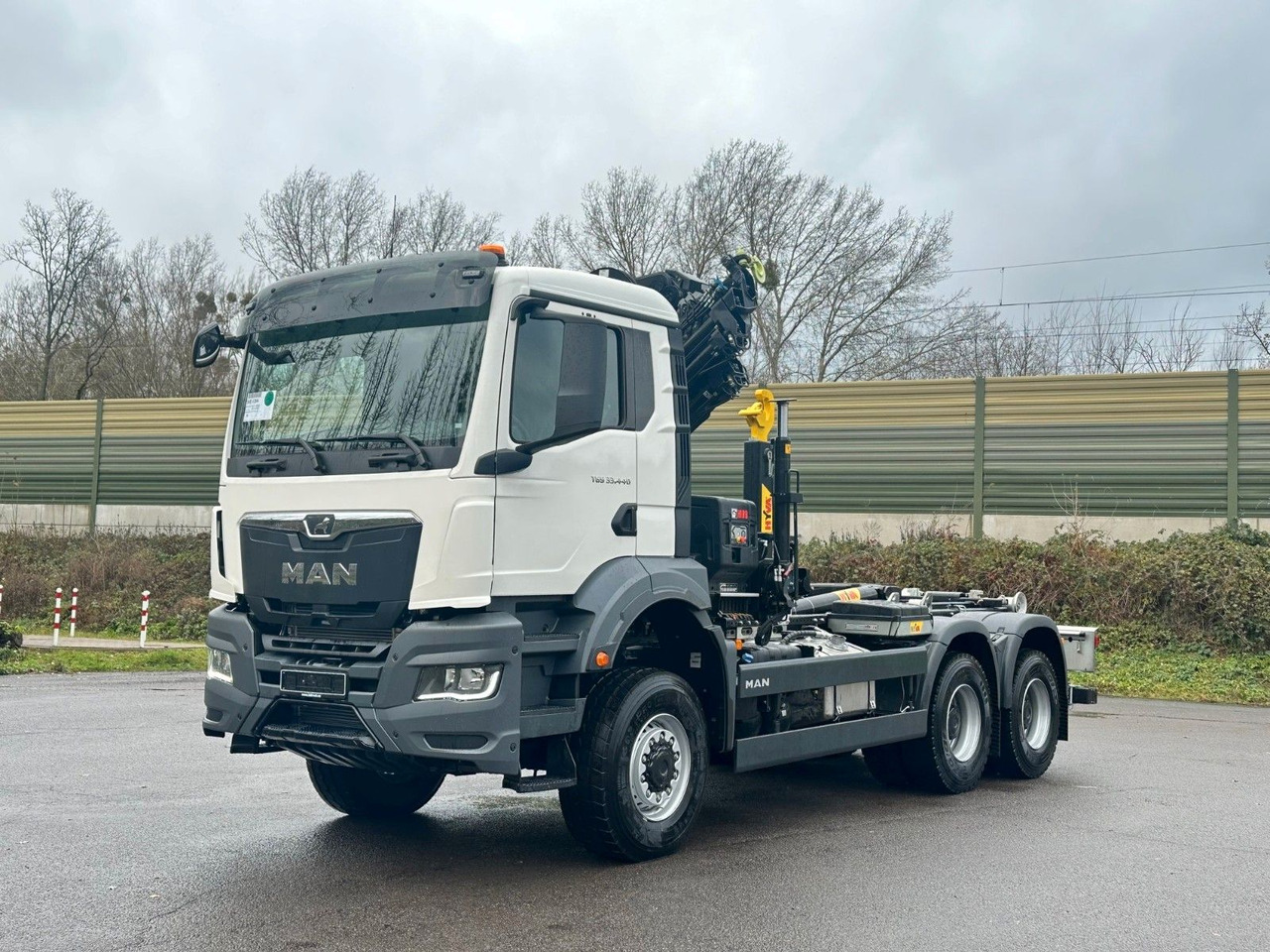 MAN TGS 33.440 6x6 BB Abrollkipper+Kran Hiab 228-6 - Kancalı yükleyici kamyon, Vinçli kamyon: fotoğraf 2 MAN TGS 33.440 6x6 BB Abrollkipper+Kran Hiab 228-6 - Kancalı yükleyici kamyon, Vinçli kamyon: fotoğraf 2