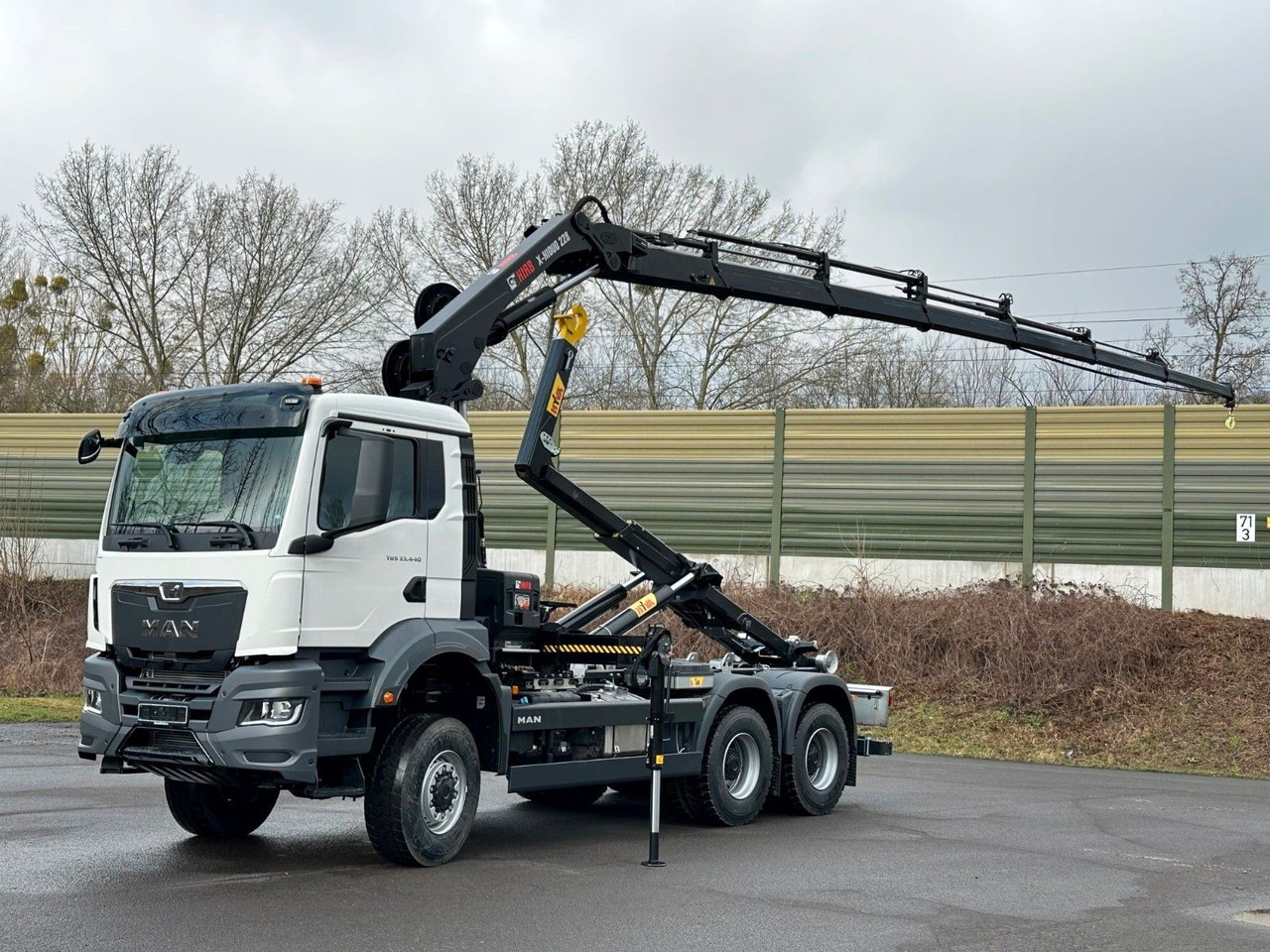 MAN TGS 33.440 6x6 BB Abrollkipper+Kran Hiab 228-6 - Kancalı yükleyici kamyon, Vinçli kamyon: fotoğraf 1 MAN TGS 33.440 6x6 BB Abrollkipper+Kran Hiab 228-6 - Kancalı yükleyici kamyon, Vinçli kamyon: fotoğraf 1