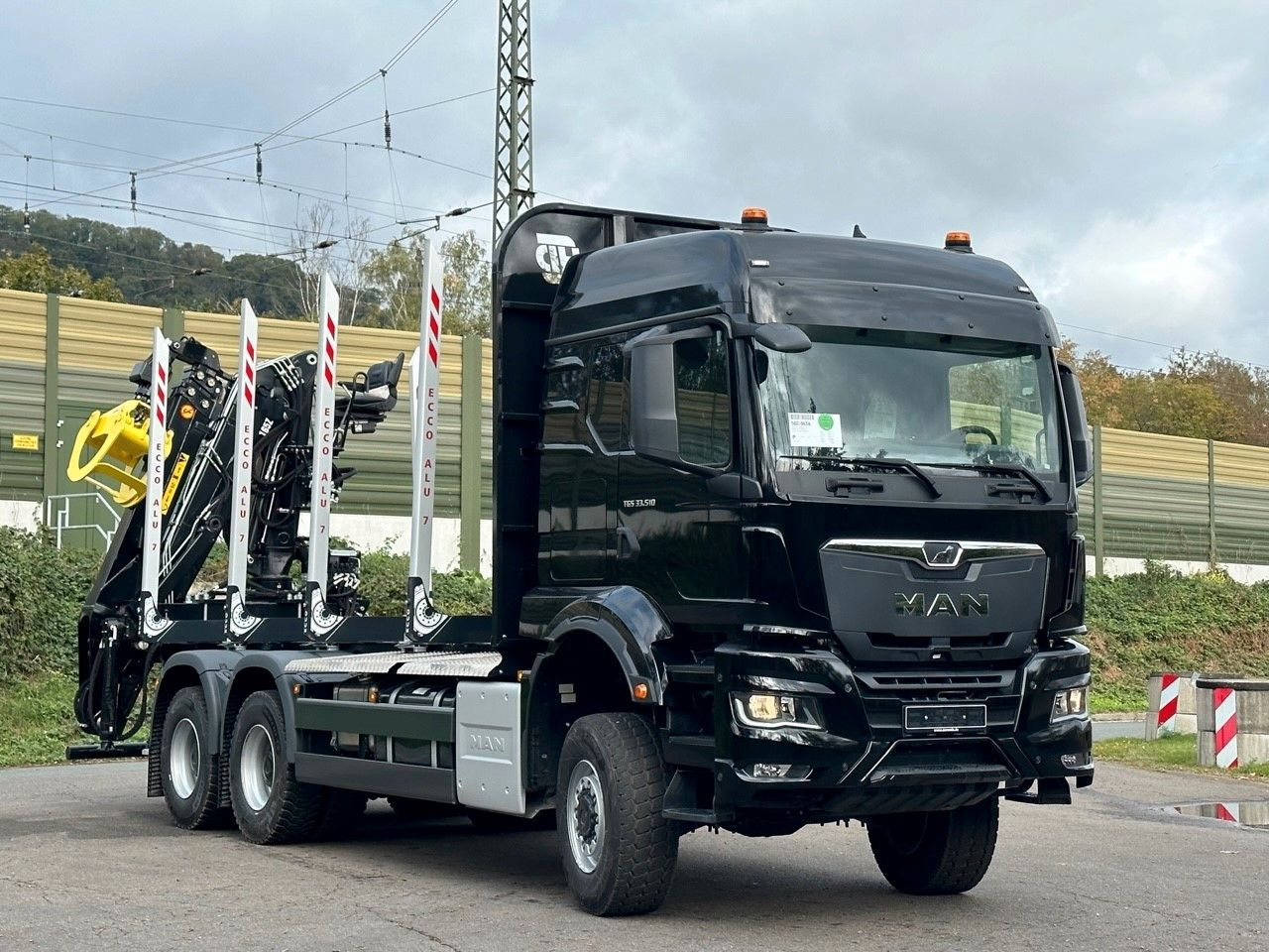MAN TGS 33.520 6X6 Euro6e LogLift 165 Z - Tomruk kamyonu, Vinçli kamyon: fotoğraf 1 MAN TGS 33.520 6X6 Euro6e LogLift 165 Z - Tomruk kamyonu, Vinçli kamyon: fotoğraf 1