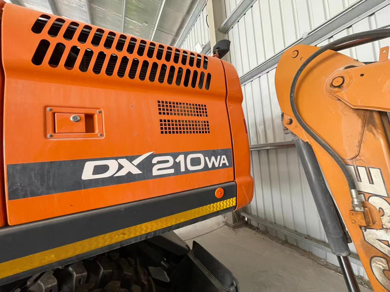 DOOSAN DX210 - Tekerlekli ekskavatör: fotoğraf 3 DOOSAN DX210 - Tekerlekli ekskavatör: fotoğraf 3