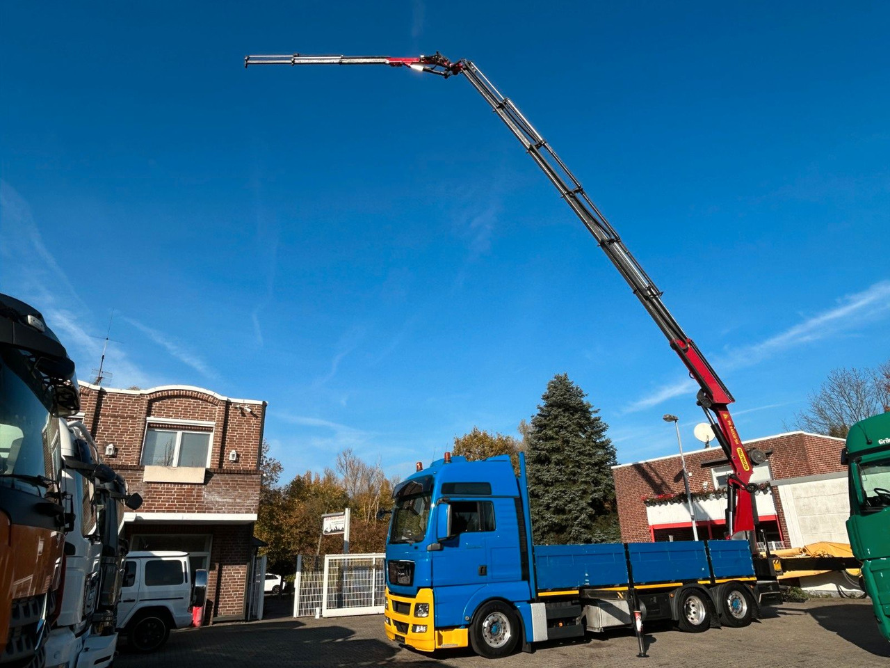 MAN 26.440 TGX Pritsche + PK 34002 + JIB Seilwinde - Vinçli kamyon: fotoğraf 1 MAN 26.440 TGX Pritsche + PK 34002 + JIB Seilwinde - Vinçli kamyon: fotoğraf 1