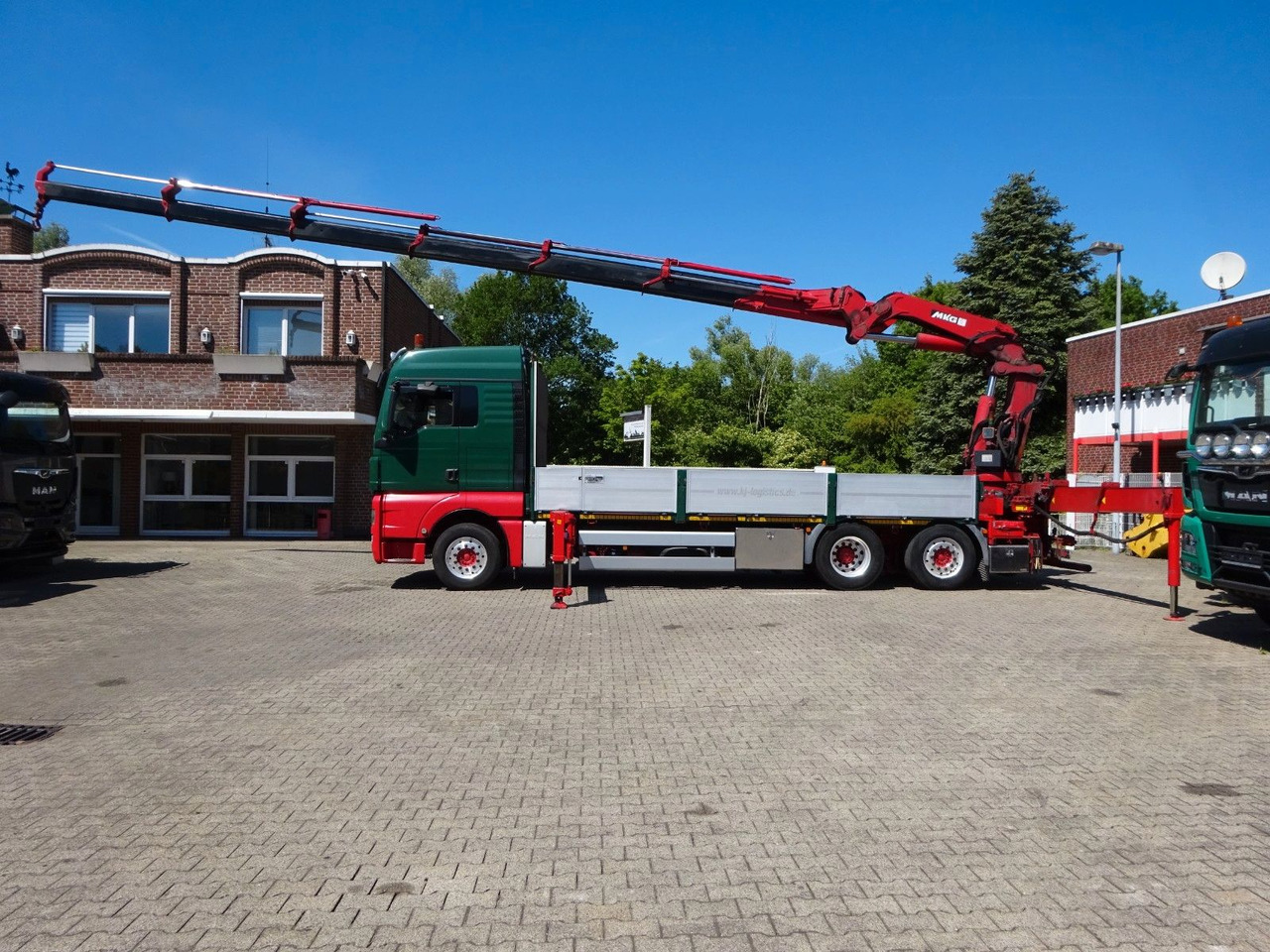 MAN 26.480 TGX + MKG HLK531 Kran +Lift-Lenkachse - Sal/ Açık kasa kamyon, Vinçli kamyon: fotoğraf 1 MAN 26.480 TGX + MKG HLK531 Kran +Lift-Lenkachse - Sal/ Açık kasa kamyon, Vinçli kamyon: fotoğraf 1