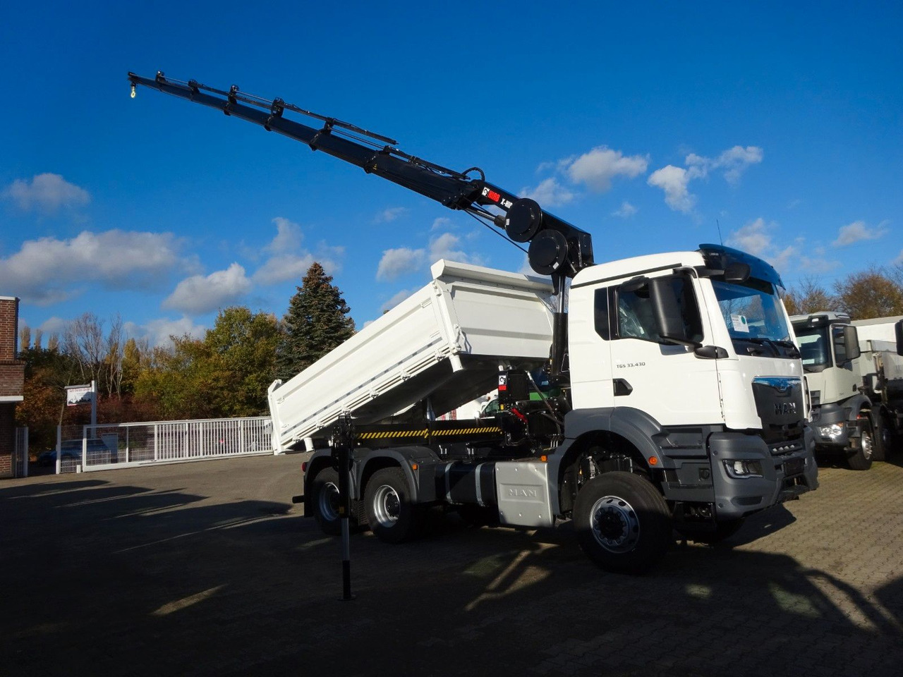 MAN 33.430 6x6 3-SEITENKIPPER KRAN HIAB 228- 6HYDRO - Damperli kamyon, Vinçli kamyon: fotoğraf 1 MAN 33.430 6x6 3-SEITENKIPPER KRAN HIAB 228- 6HYDRO - Damperli kamyon, Vinçli kamyon: fotoğraf 1