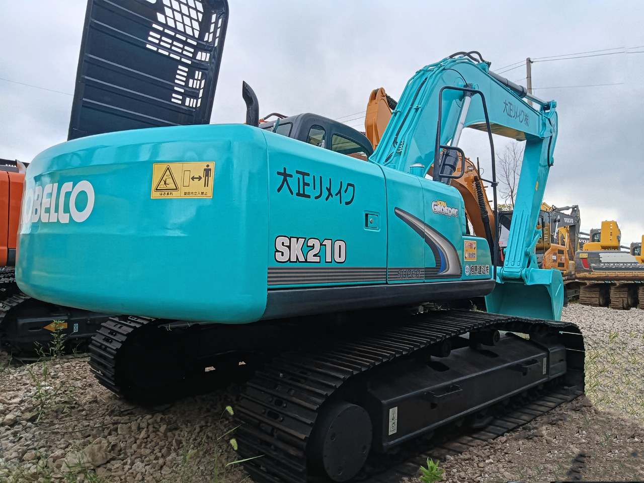KOBELCO SK 210 - Paletli ekskavatör: fotoğraf 2 KOBELCO SK 210 - Paletli ekskavatör: fotoğraf 2