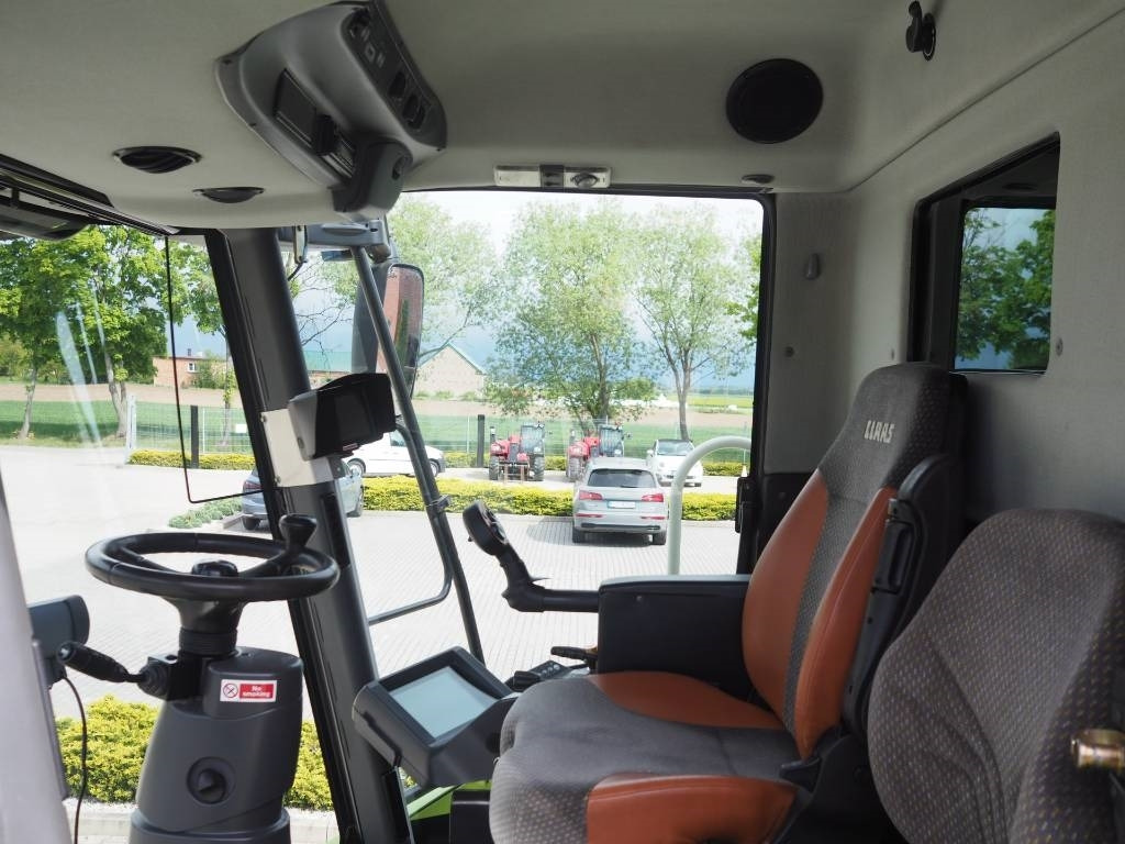 Claas Lexion 570 4WD + V750 - Biçerdöver: fotoğraf 5 Claas Lexion 570 4WD + V750 - Biçerdöver: fotoğraf 5