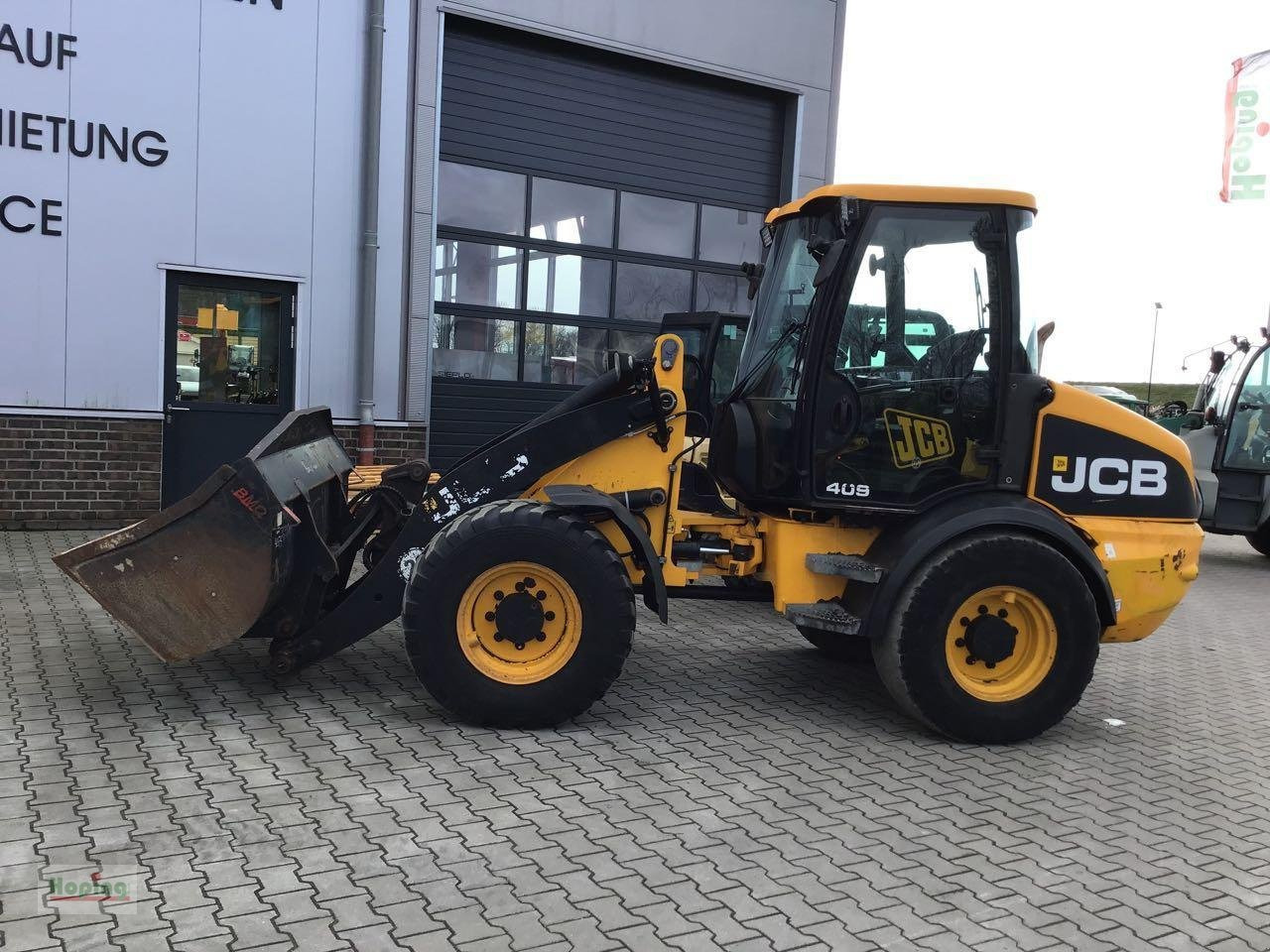 JCB 409 - Tekerlekli yükleyici: fotoğraf 1 JCB 409 - Tekerlekli yükleyici: fotoğraf 1