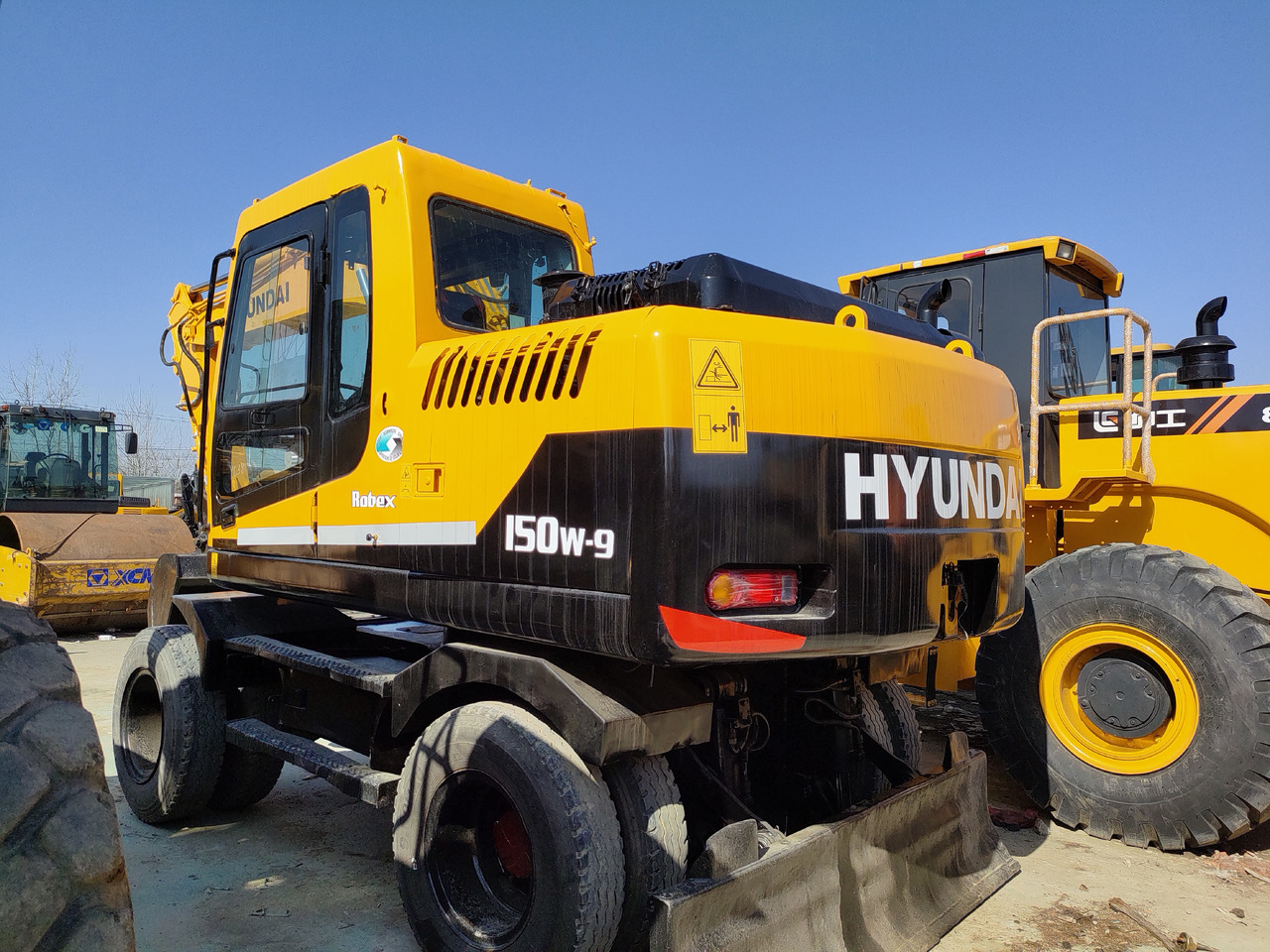 Hyundai R150W-9 - Tekerlekli ekskavatör: fotoğraf 3 Hyundai R150W-9 - Tekerlekli ekskavatör: fotoğraf 3