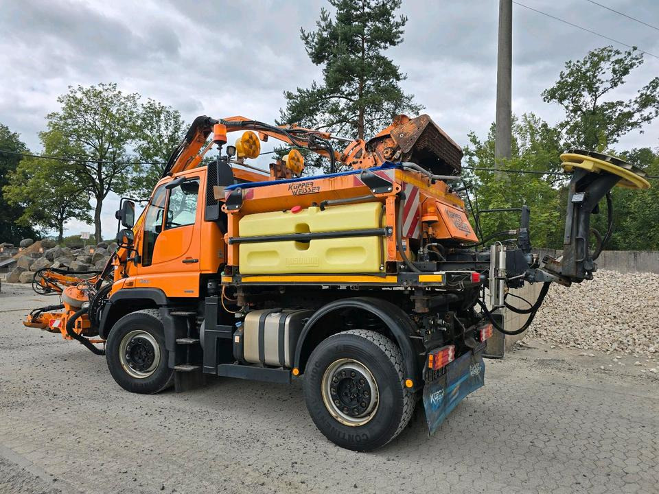 Unimog U400 2013 405/10 405/12 NKS-Z-UGN-43K Bluetec 5 Mercedes-Benz UGE UGN Mulag MKM700 Mähausleger Böschungsmäher Böschungsmulcher Küpper-Weisser IMS Salzstreuer - Kar küreme aracı: fotoğraf 3 Unimog U400 2013 405/10 405/12 NKS-Z-UGN-43K Bluetec 5 Mercedes-Benz UGE UGN Mulag MKM700 Mähausleger Böschungsmäher Böschungsmulcher Küpper-Weisser IMS Salzstreuer - Kar küreme aracı: fotoğraf 3