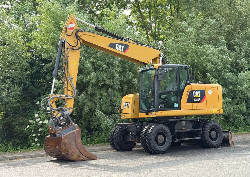 Caterpillar CAT 318 F * Powertilt * Sprowadzony* 9700 MTG * Caterpillar * Stan Perfekcyjny - Tekerlekli ekskavatör: fotoğraf 1 Caterpillar CAT 318 F * Powertilt * Sprowadzony* 9700 MTG * Caterpillar * Stan Perfekcyjny - Tekerlekli ekskavatör: fotoğraf 1