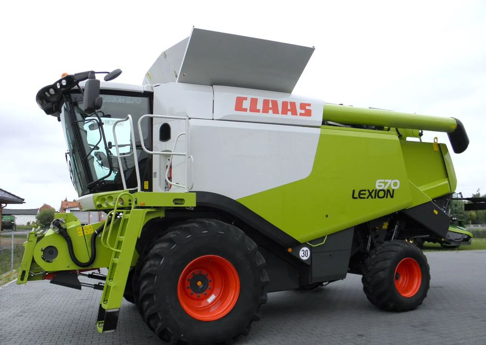 Claas Lexion 670 2014 Rok, Heder 7,5 Vario, Najbogatsza Wersja, Nie Malowany, Stan Idealny - Biçerdöver: fotoğraf 2 Claas Lexion 670 2014 Rok, Heder 7,5 Vario, Najbogatsza Wersja, Nie Malowany, Stan Idealny - Biçerdöver: fotoğraf 2