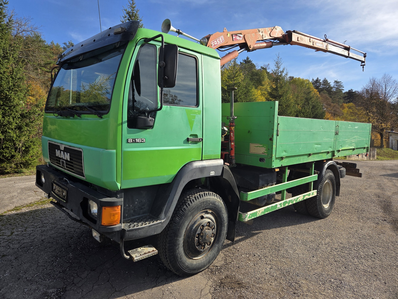 MAN 8.163 4x4 + crane FASSI F45A.22 - Sal/ Açık kasa kamyon: fotoğraf 1 MAN 8.163 4x4 + crane FASSI F45A.22 - Sal/ Açık kasa kamyon: fotoğraf 1