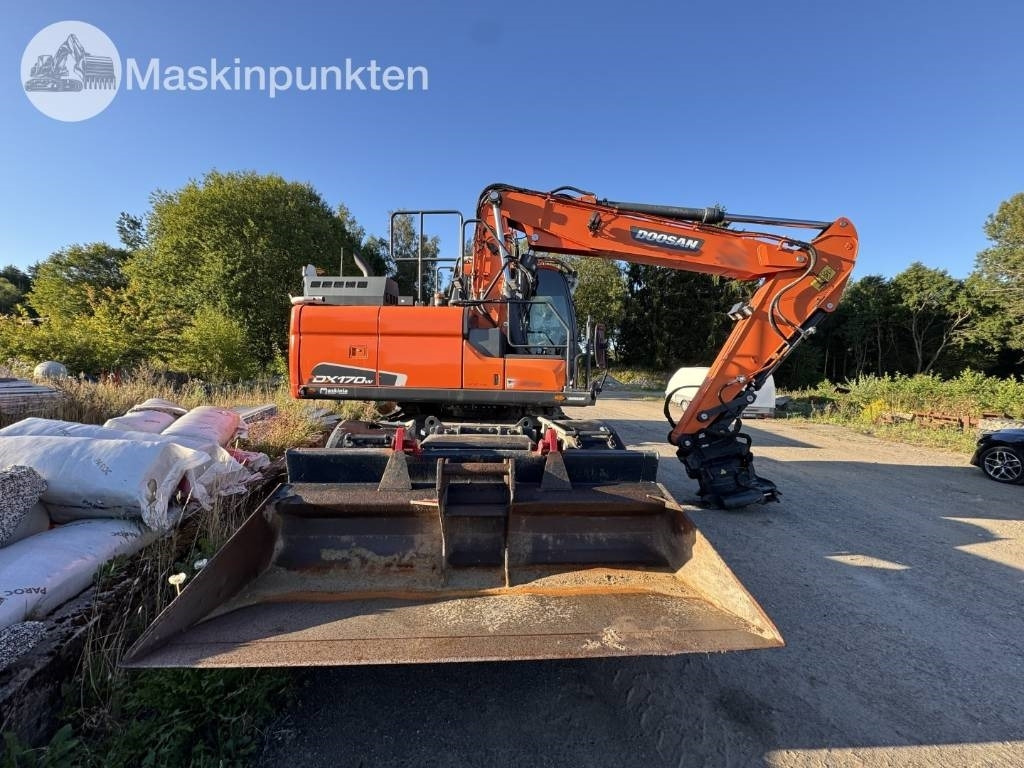 Doosan DX 170 W-5 + Tippvagn + Redskap - Tekerlekli ekskavatör: fotoğraf 4 Doosan DX 170 W-5 + Tippvagn + Redskap - Tekerlekli ekskavatör: fotoğraf 4
