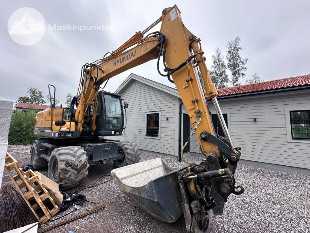 Hyundai Robex 140 W-7 A - Tekerlekli ekskavatör: fotoğraf 3 Hyundai Robex 140 W-7 A - Tekerlekli ekskavatör: fotoğraf 3