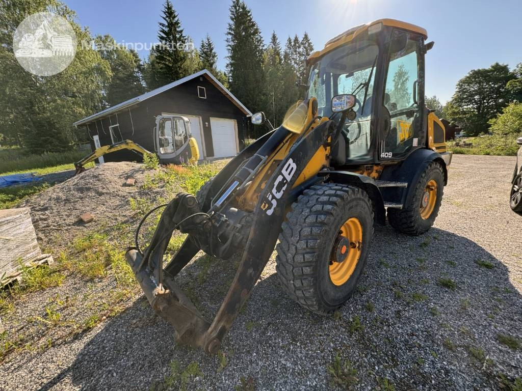 Tekerlekli yükleyici JCB 413 K: fotoğraf 1