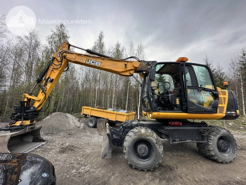 JCB JS 145 W - Tekerlekli ekskavatör: fotoğraf 1 JCB JS 145 W - Tekerlekli ekskavatör: fotoğraf 1