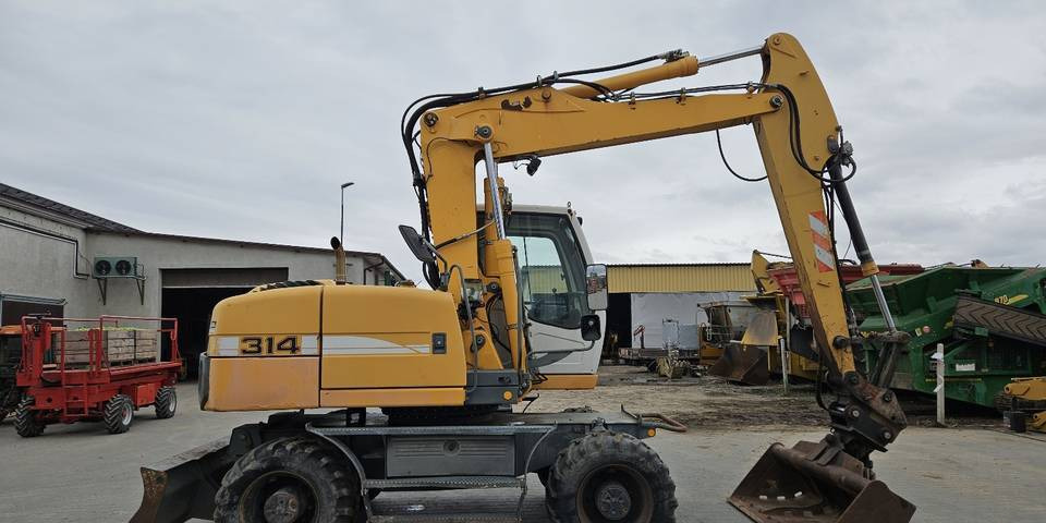Koparka kołowa Liebherr A314 Litronic 9350 h 4 łyżki kołówka - Tekerlekli ekskavatör: fotoğraf 5 Koparka kołowa Liebherr A314 Litronic 9350 h 4 łyżki kołówka - Tekerlekli ekskavatör: fotoğraf 5