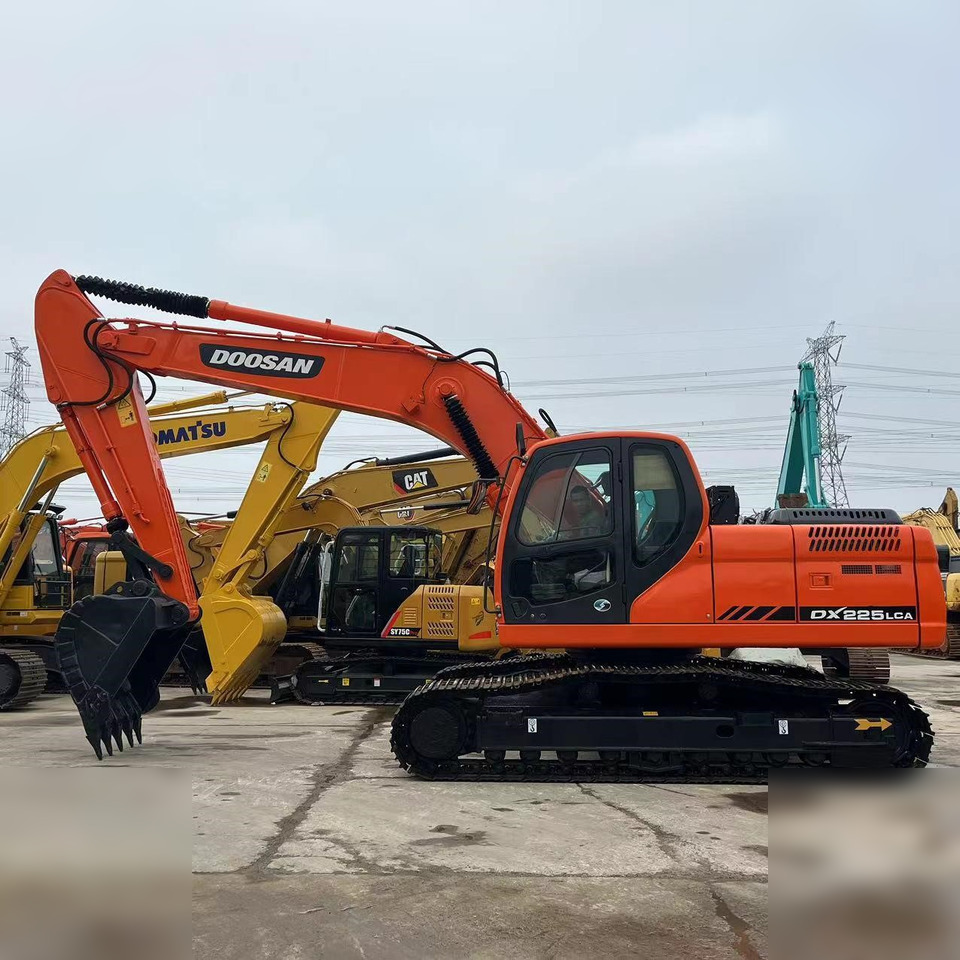 DOOSAN DX225 LCA - Paletli ekskavatör: fotoğraf 1 DOOSAN DX225 LCA - Paletli ekskavatör: fotoğraf 1