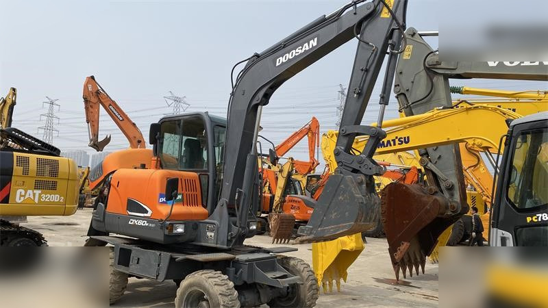 DOOSAN DX60W ECO - Tekerlekli ekskavatör: fotoğraf 3 DOOSAN DX60W ECO - Tekerlekli ekskavatör: fotoğraf 3