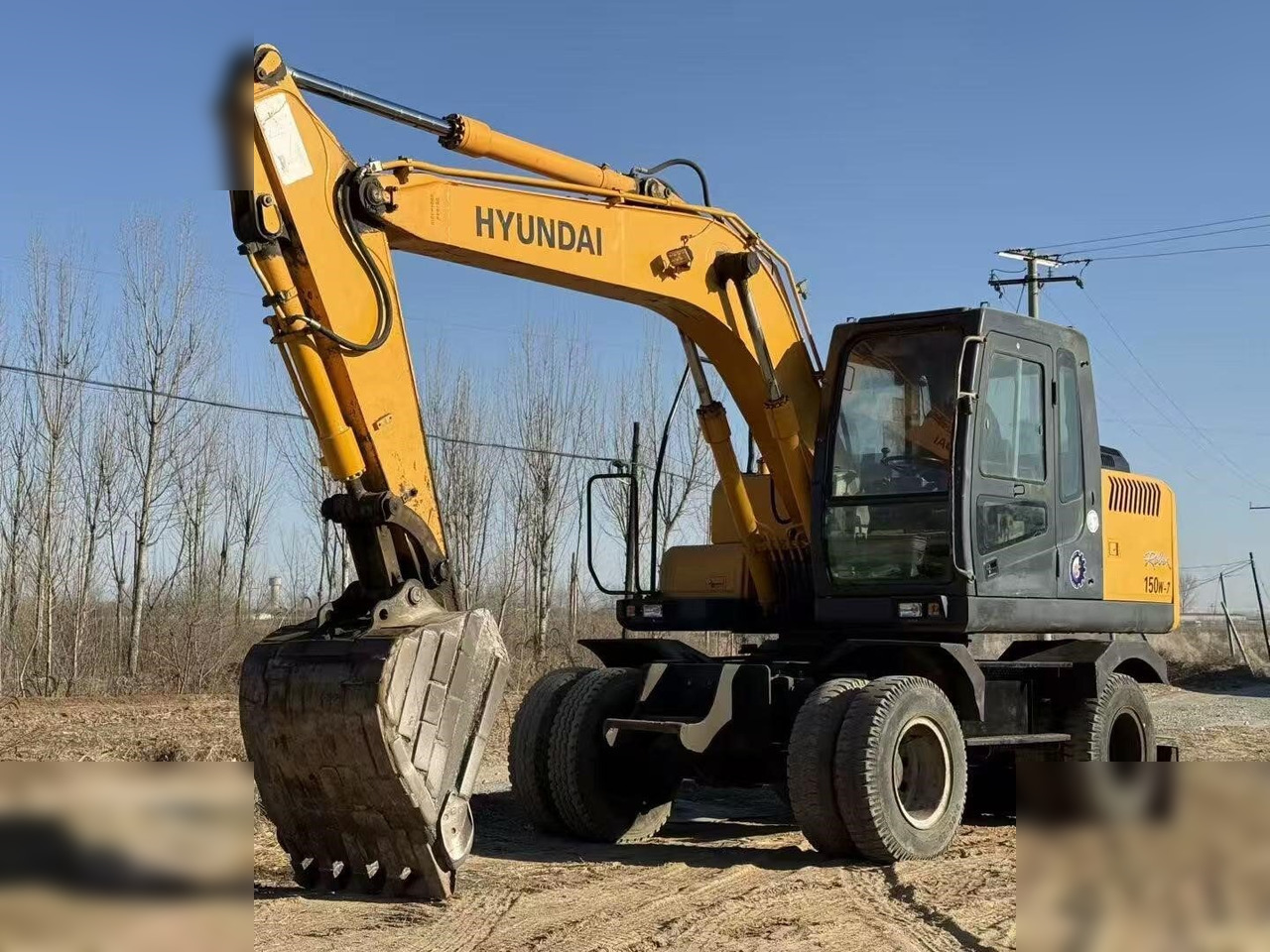 HYUNDAI ROBEX 150W-7A - Tekerlekli ekskavatör: fotoğraf 3 HYUNDAI ROBEX 150W-7A - Tekerlekli ekskavatör: fotoğraf 3