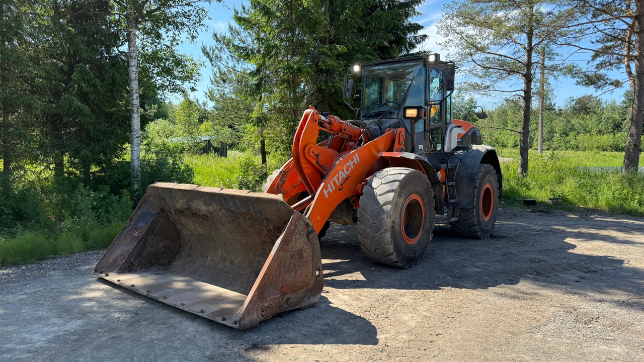 Hitachi ZW140 - Tekerlekli yükleyici: fotoğraf 1 Hitachi ZW140 - Tekerlekli yükleyici: fotoğraf 1