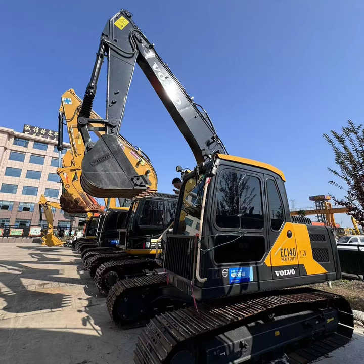 Used Digger VOLVO EC140 Construction Machinery Construction Digger Used VOLVO EC140 Cheap Excavator - Paletli ekskavatör: fotoğraf 1 Used Digger VOLVO EC140 Construction Machinery Construction Digger Used VOLVO EC140 Cheap Excavator - Paletli ekskavatör: fotoğraf 1