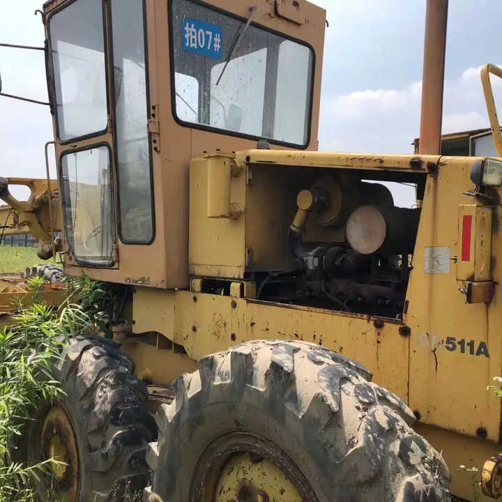 Japan Komatsu GD511 Motor Grader Cheap Price Komatsu Road Grader GD511 Good Condition in China - Greyder: fotoğraf 1 Japan Komatsu GD511 Motor Grader Cheap Price Komatsu Road Grader GD511 Good Condition in China - Greyder: fotoğraf 1
