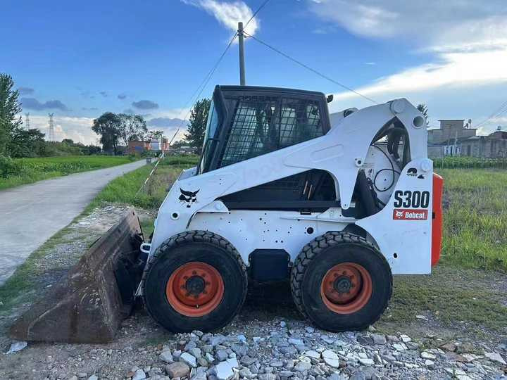 Used Bob Cat Bob Cat S300 Used Mini Skid Steer Wheel Loader Multifunctional Track Loaders Bobcat S300 - Mini yükleyici: fotoğraf 4 Used Bob Cat Bob Cat S300 Used Mini Skid Steer Wheel Loader Multifunctional Track Loaders Bobcat S300 - Mini yükleyici: fotoğraf 4