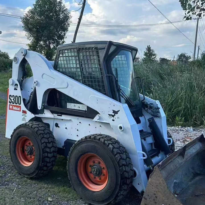 Used Bob Cat Bob Cat S300 Used Mini Skid Steer Wheel Loader Multifunctional Track Loaders Bobcat S300 - Mini yükleyici: fotoğraf 1 Used Bob Cat Bob Cat S300 Used Mini Skid Steer Wheel Loader Multifunctional Track Loaders Bobcat S300 - Mini yükleyici: fotoğraf 1