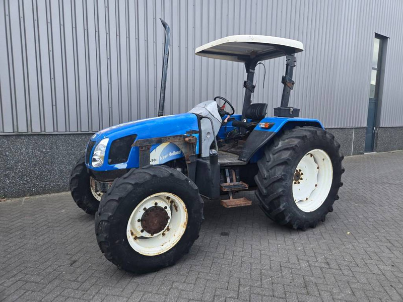 New Holland TL 90 A - Traktör: fotoğraf 1 New Holland TL 90 A - Traktör: fotoğraf 1