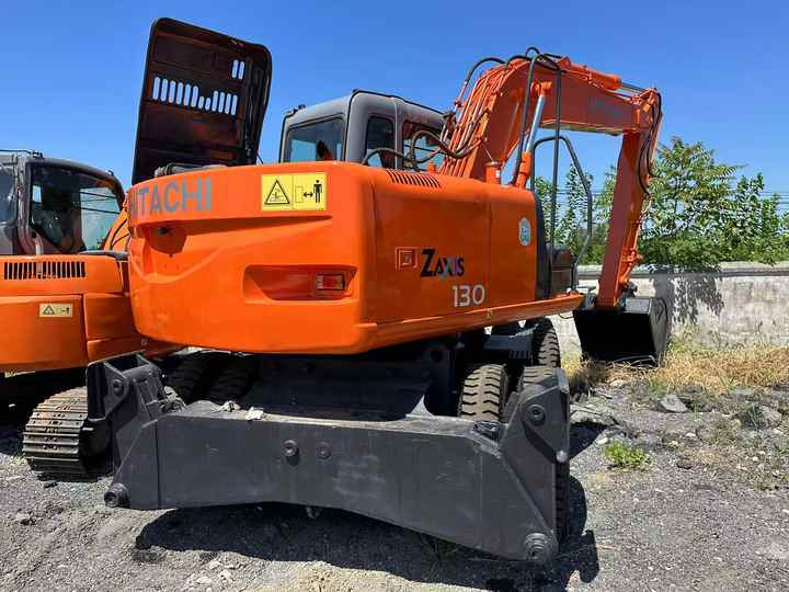 Used Wheel Excavator Hitachi ZX 130W Made in Japan 13ton Hitachi Zx130w Wheel Excavator Price Used Hitachi Zx130 Excavator SALE - Ekskavatör: fotoğraf 2 Used Wheel Excavator Hitachi ZX 130W Made in Japan 13ton Hitachi Zx130w Wheel Excavator Price Used Hitachi Zx130 Excavator SALE - Ekskavatör: fotoğraf 2