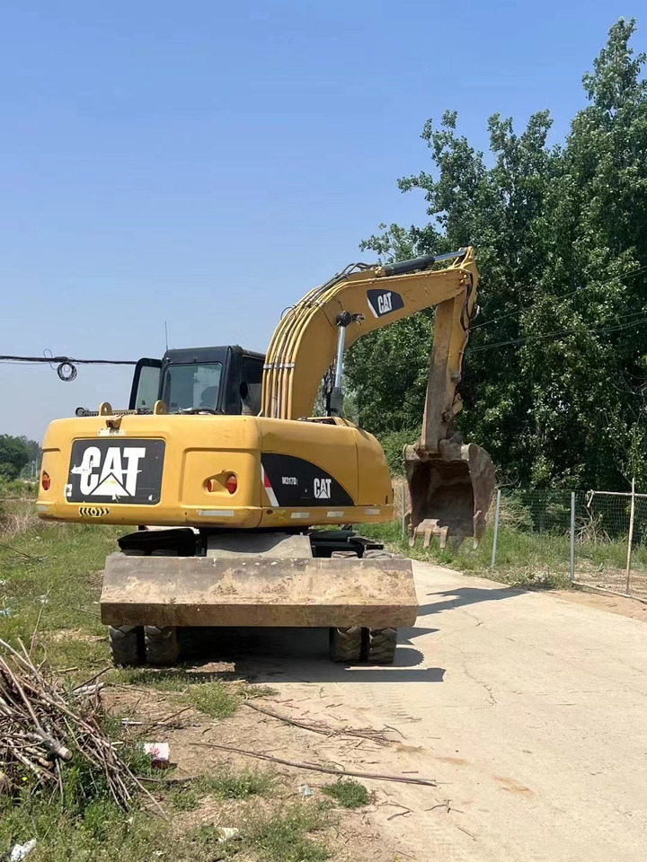 CATERPILLAR M317 - Tekerlekli ekskavatör: fotoğraf 2 CATERPILLAR M317 - Tekerlekli ekskavatör: fotoğraf 2