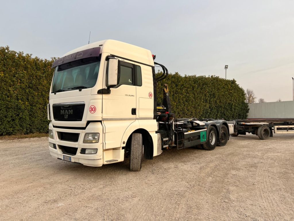MAN TGX 26.440 SCARRABILE CON GRU - Kancalı yükleyici kamyon: fotoğraf 1 MAN TGX 26.440 SCARRABILE CON GRU - Kancalı yükleyici kamyon: fotoğraf 1