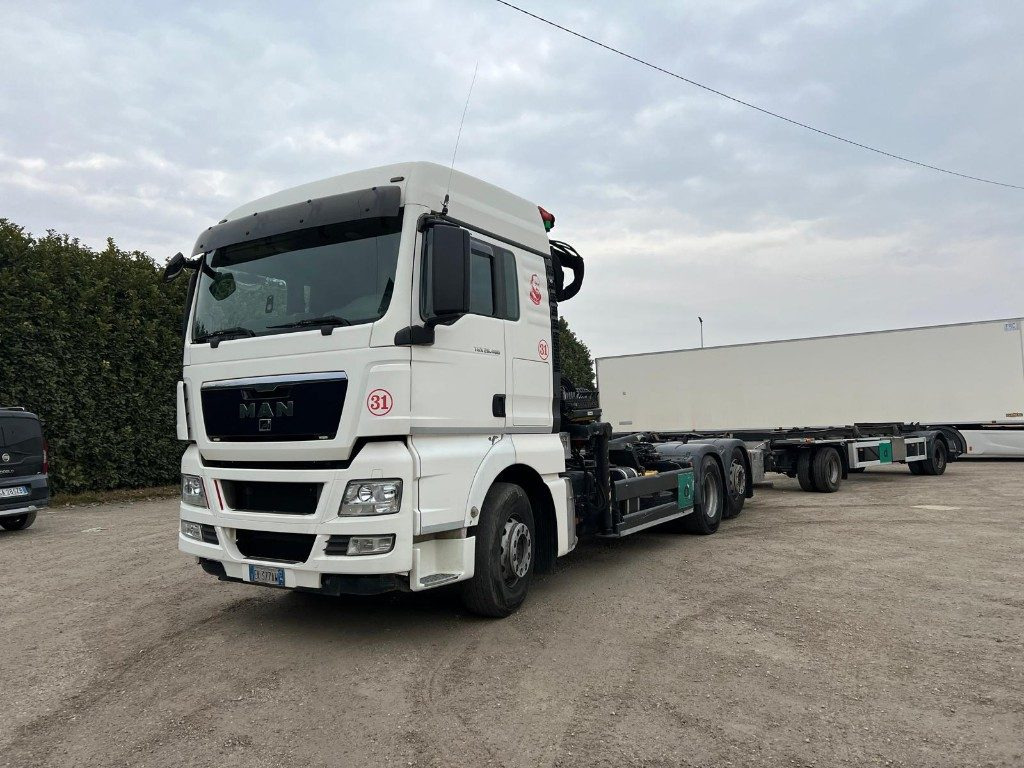 MAN TGX 26.480 SCARRABILE CON GRU - Kancalı yükleyici kamyon: fotoğraf 1 MAN TGX 26.480 SCARRABILE CON GRU - Kancalı yükleyici kamyon: fotoğraf 1