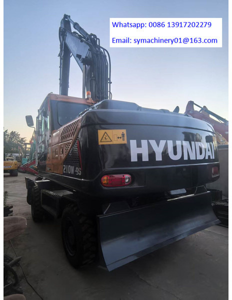 Hyundai R210W-9S - Tekerlekli ekskavatör: fotoğraf 1 Hyundai R210W-9S - Tekerlekli ekskavatör: fotoğraf 1