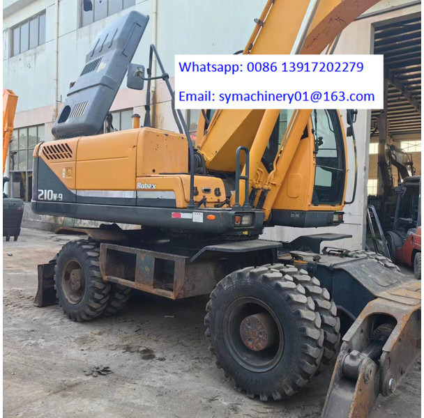 Hyundai R210W - Tekerlekli ekskavatör: fotoğraf 4 Hyundai R210W - Tekerlekli ekskavatör: fotoğraf 4