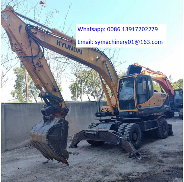 Hyundai R210W - Tekerlekli ekskavatör: fotoğraf 2 Hyundai R210W - Tekerlekli ekskavatör: fotoğraf 2