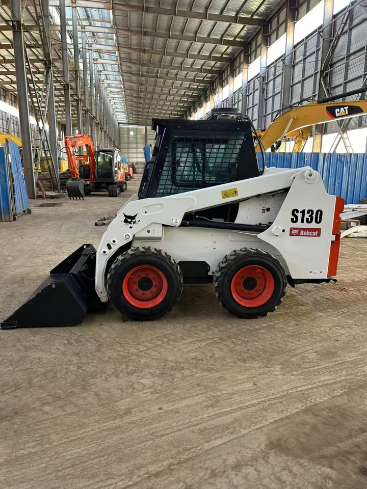 BOBCAT Skid Steer Loader S130 - Mini yükleyici: fotoğraf 1 BOBCAT Skid Steer Loader S130 - Mini yükleyici: fotoğraf 1