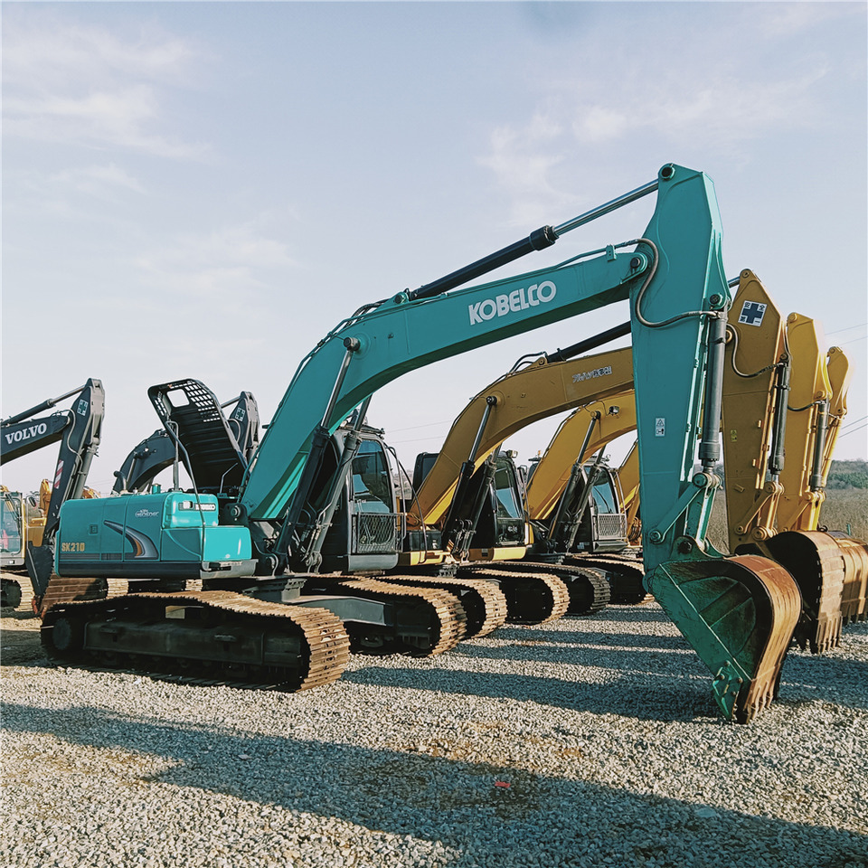 KOBELCO SK210 - Paletli ekskavatör: fotoğraf 1 KOBELCO SK210 - Paletli ekskavatör: fotoğraf 1