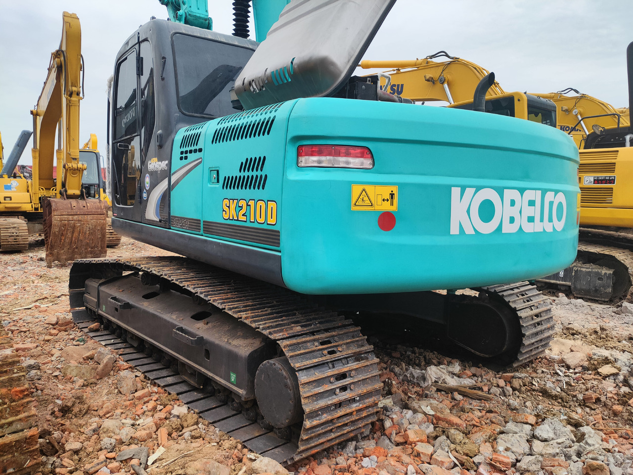 KOBELCO SK210D - Paletli ekskavatör: fotoğraf 2 KOBELCO SK210D - Paletli ekskavatör: fotoğraf 2