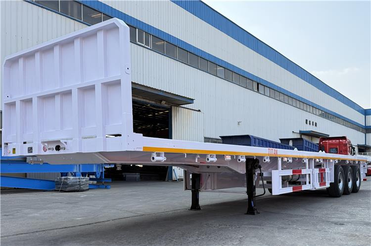 TITAN 3 Axle Flatbed Semi Trailer with Front Wall for Sale In Dominican - Konteynır taşıyıcı/ Yedek karoser dorse: fotoğraf 3 TITAN 3 Axle Flatbed Semi Trailer with Front Wall for Sale In Dominican - Konteynır taşıyıcı/ Yedek karoser dorse: fotoğraf 3