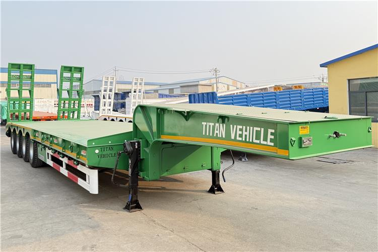 TITAN 4 Axle 100 Ton Low Bed Truck Trailer for Sale In Zimbabwe - Alçak çerçeveli platform dorse: fotoğraf 1 TITAN 4 Axle 100 Ton Low Bed Truck Trailer for Sale In Zimbabwe - Alçak çerçeveli platform dorse: fotoğraf 1