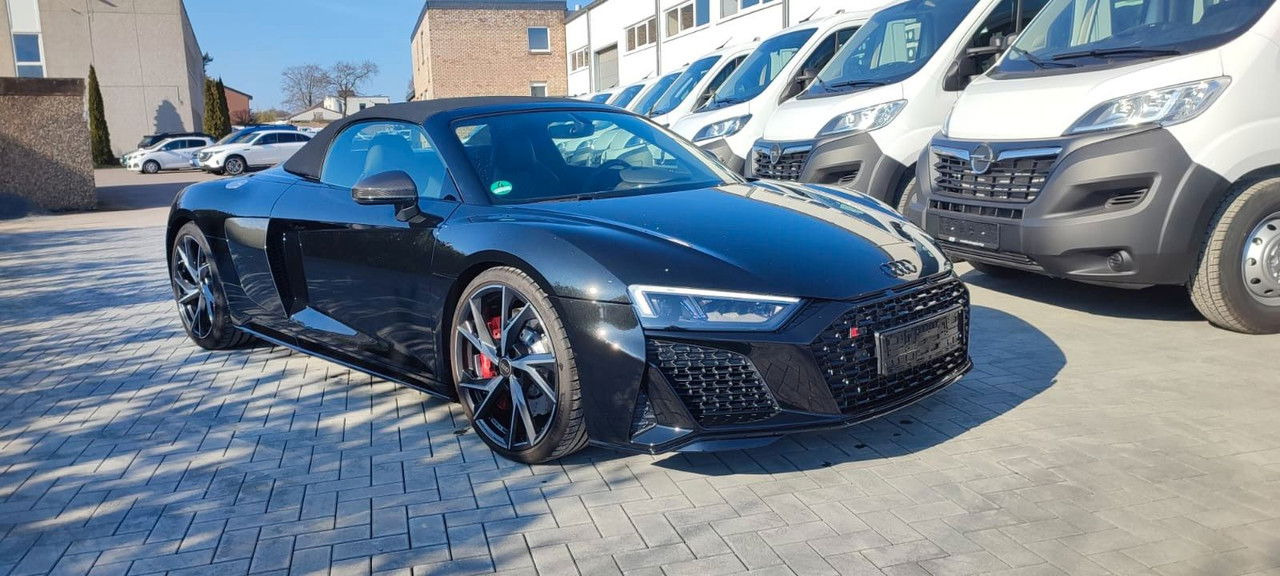 Audi R8 Spyder 5.2 FSI RWD performance - Binek araba: fotoğraf 4 Audi R8 Spyder 5.2 FSI RWD performance - Binek araba: fotoğraf 4