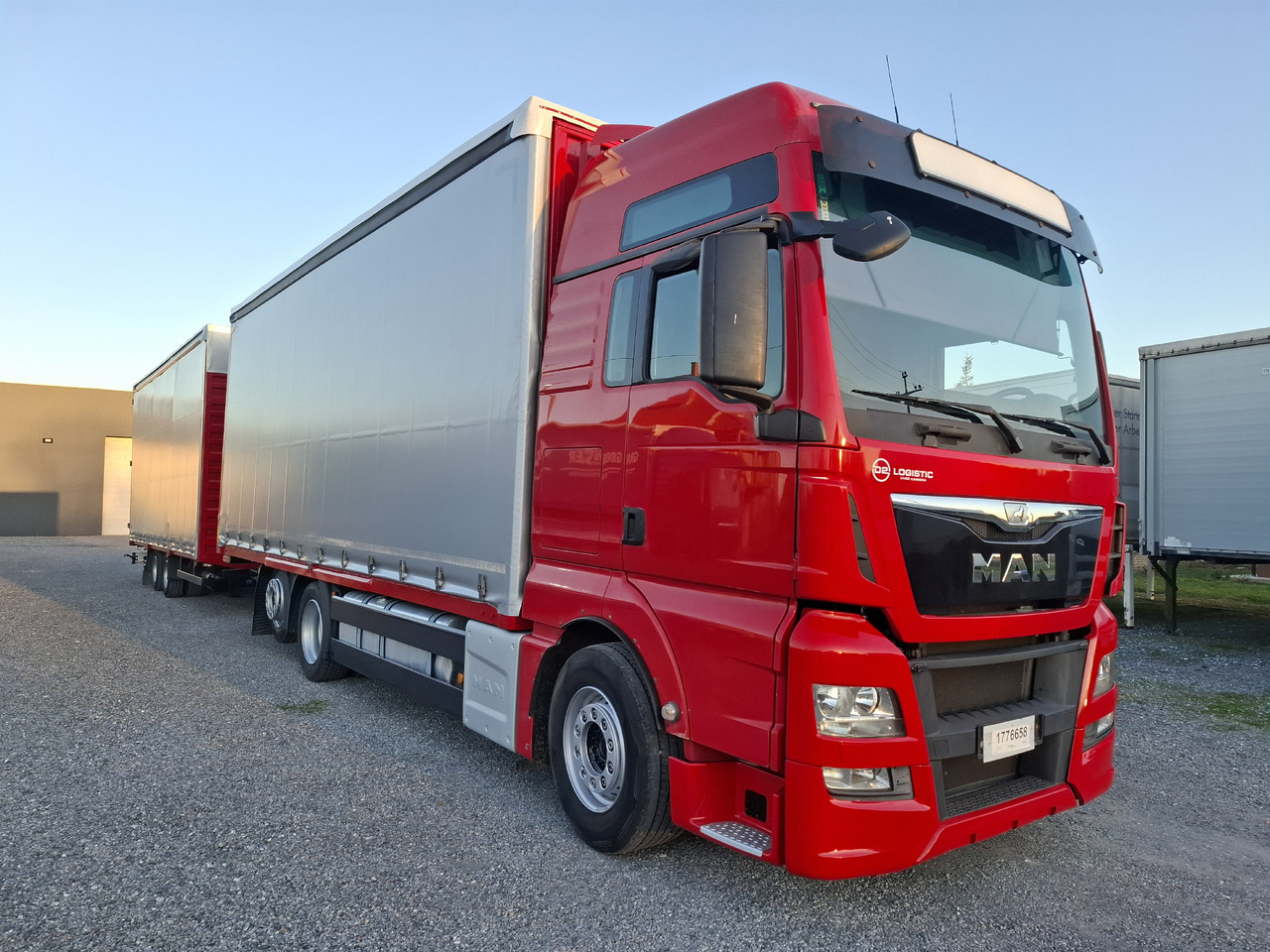 MAN TGX 26.440 E6 + SCHMITZ - Tenteli kamyon: fotoğraf 4 MAN TGX 26.440 E6 + SCHMITZ - Tenteli kamyon: fotoğraf 4