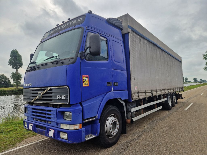 Volvo FH 12 380 - Tenteli kamyon: fotoğraf 1 Volvo FH 12 380 - Tenteli kamyon: fotoğraf 1