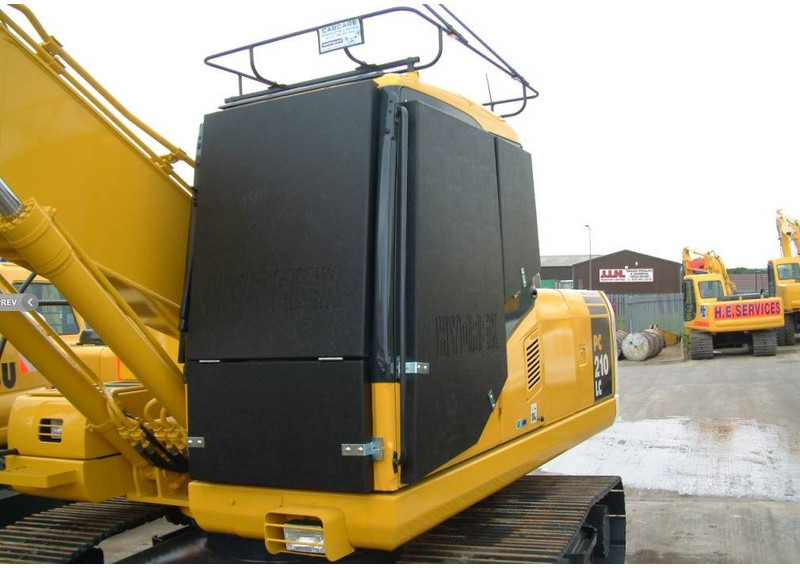 Komatsu PC210 VANDAL PROTECTION - Ataşman - İş makinaları: fotoğraf 1 Komatsu PC210 VANDAL PROTECTION - Ataşman - İş makinaları: fotoğraf 1