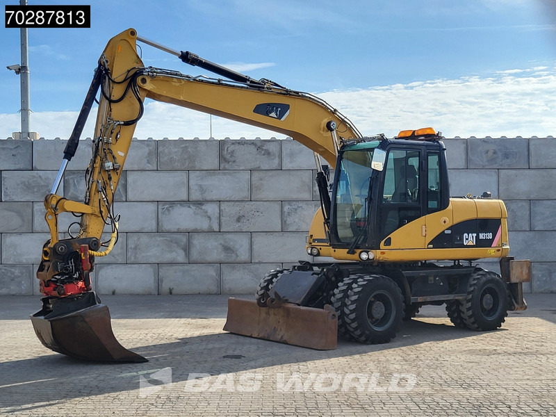 Caterpillar M313 D OUTRIGGERS + BLADE - Tekerlekli ekskavatör: fotoğraf 2 Caterpillar M313 D OUTRIGGERS + BLADE - Tekerlekli ekskavatör: fotoğraf 2