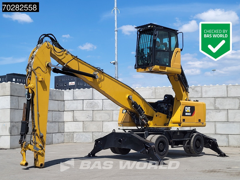 Caterpillar MH3022 - Elleçleme makinesi: fotoğraf 1 Caterpillar MH3022 - Elleçleme makinesi: fotoğraf 1