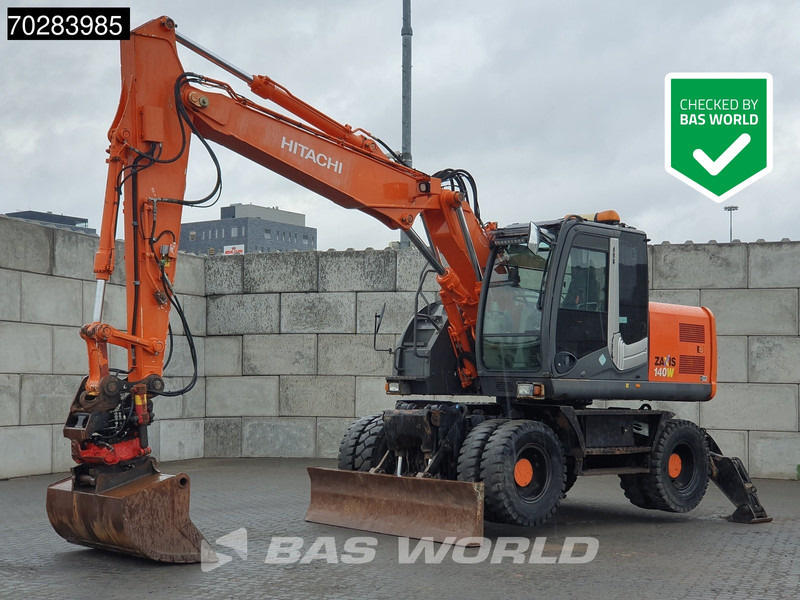 Hitachi ZX140W -3 OUTRIGGERS - ROTOTILT - Tekerlekli ekskavatör: fotoğraf 1 Hitachi ZX140W -3 OUTRIGGERS - ROTOTILT - Tekerlekli ekskavatör: fotoğraf 1